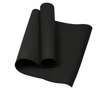 Black anti-slip yoga mat rolled and partially unrolled for home workout.