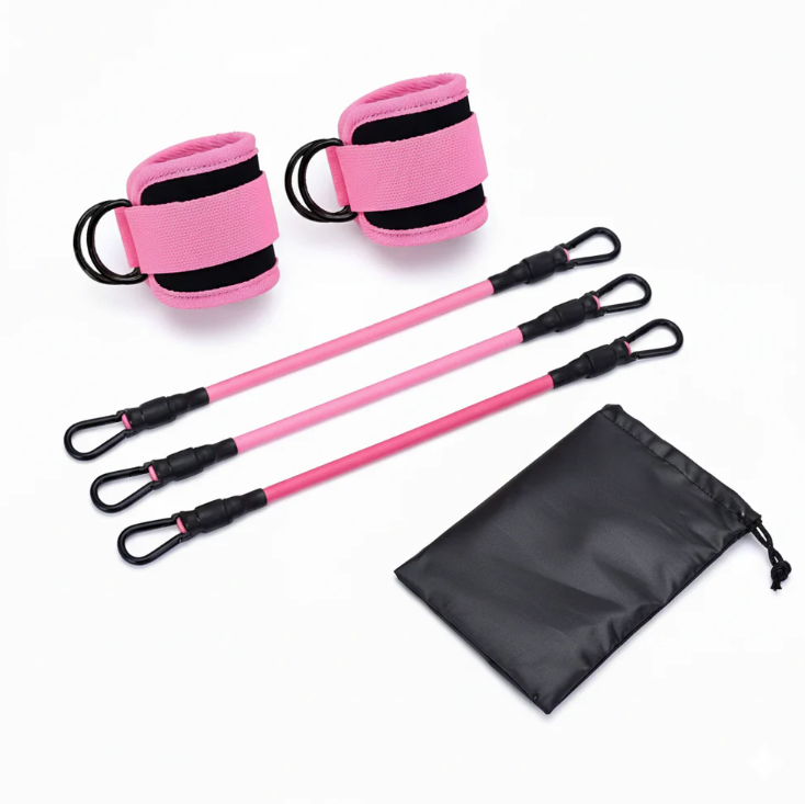 Pink ankle resistance bands with adjustable cuffs and carry bag.